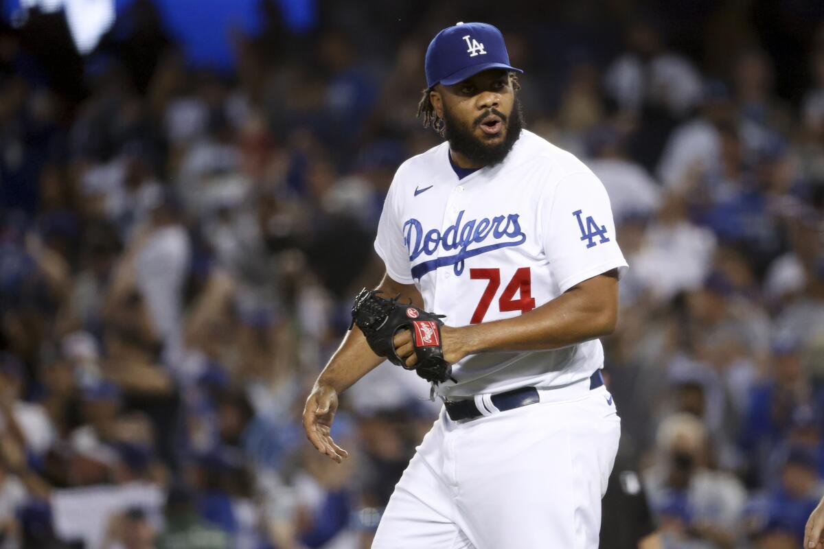 Dodgers closer Kenley Jansen reacts on the mound during the ninth inning in Game 3 of the NLCS.