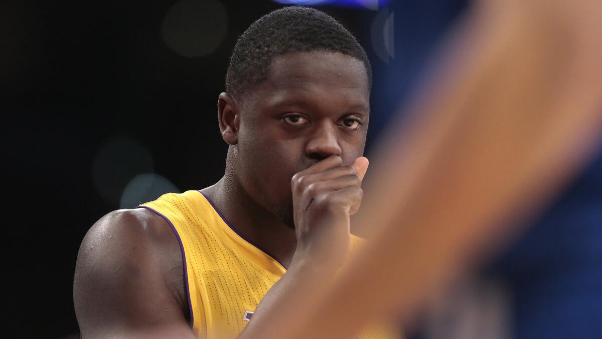 Lakers rookie forward Julius Randle looks on during an exhibition game against the Golden State Warriors at Staples Center on Oct. 9.