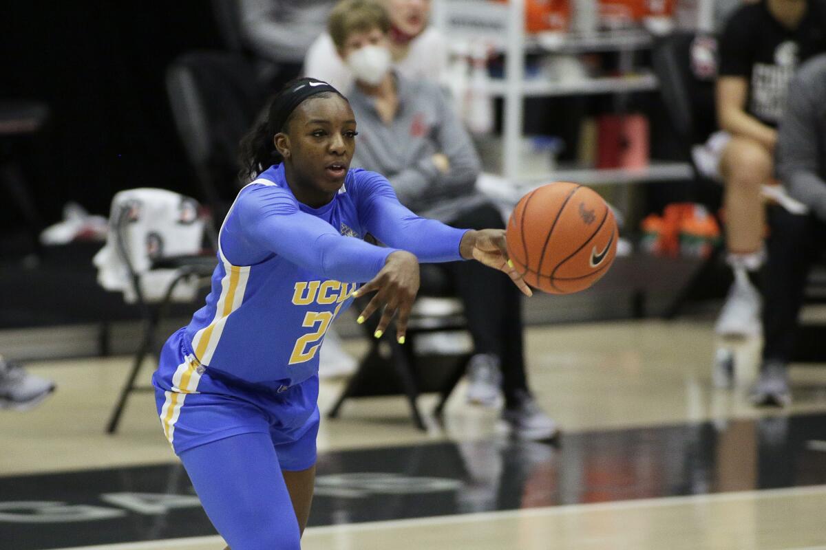 UCLA forward Michaela Onyenwere passes the ball during a game against Washington State on Feb. 5.