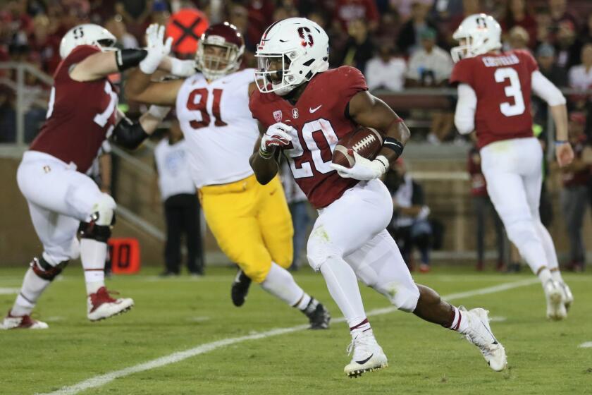 Stanford running back Bryce Love turns the corner and runs for a 59-yard gain in the third quarter against USC.
