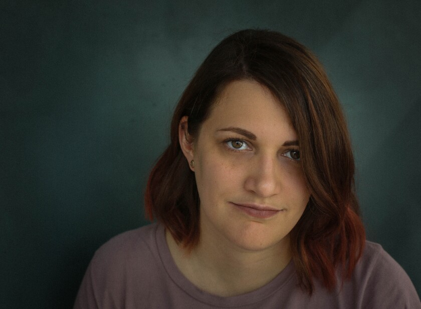 A portrait of a woman looking into the camera