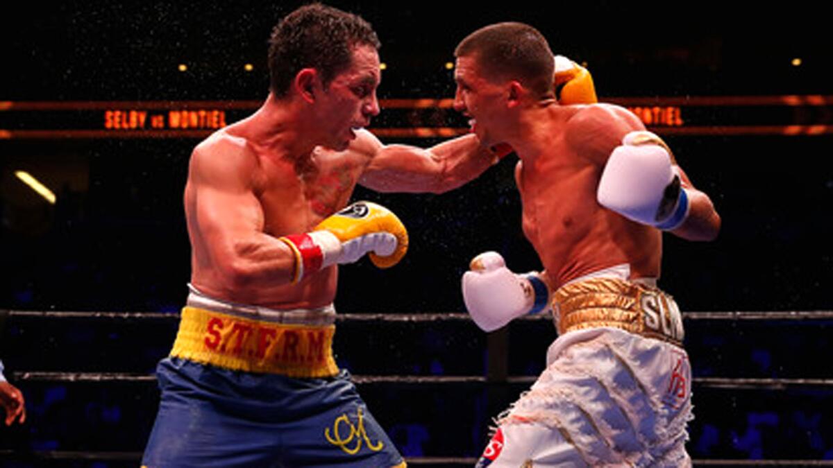 Fernando Montiel, left, trades punches with Lee Selby during a fight last year.