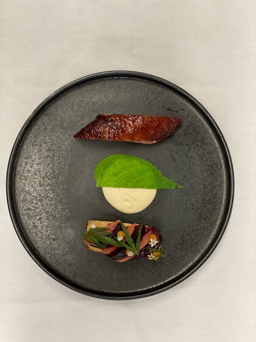 A duck dish from Avant Restaurant's new $135 tasting menu.