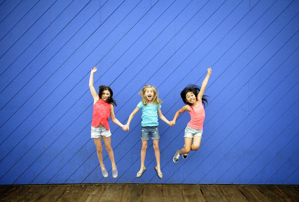 The three Matildas; Mia Sinclair Jenness, left, Mabel Tyler and Gabby Gutierrez at the Santa Monica Pier on June 16, 2015.
