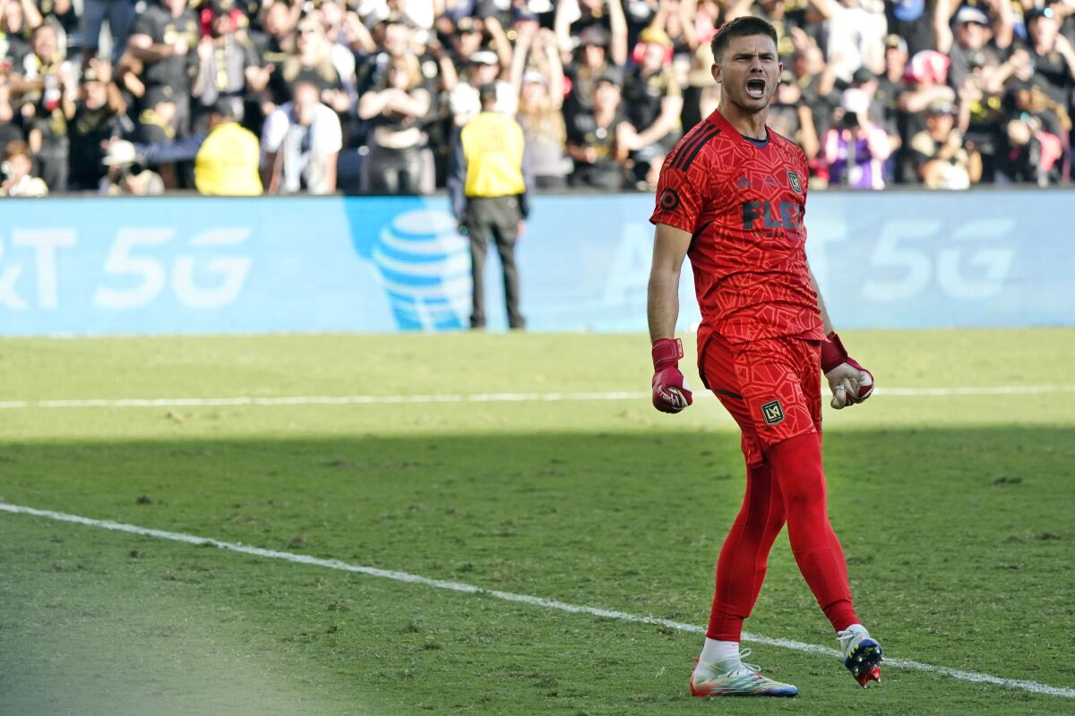 LAFC goalkeeper John McCarthy celebrates after making a stop during a penalty-kick shootout against the Philadelphia Union.