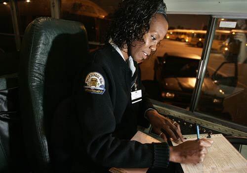At 6 a.m., after about 20 minutes of inspections, Walters writes up her report before she leaves the bus yard in Gardena to pick up her students in South L.A., bound for Crenshaw High School and Audubon Middle School.