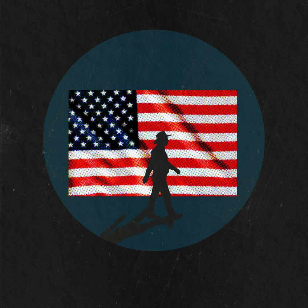 A photo illustration of a person walking in silhouette with the U.S. flag beyond them