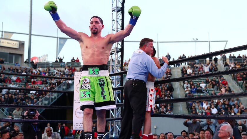 Danny Garcia celebrates after knocking out Adrian Granados in the seventh round.