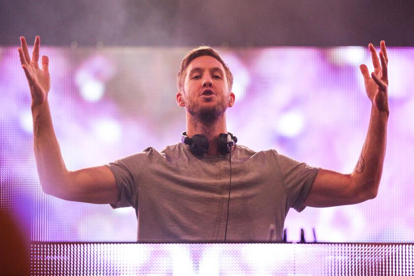 In this Oct. 24, 2015, file photo, DJ Calvin Harris performs at the We Can Survive Concert at the Hollywood Bowl in Los Angeles. Harris is resting after he was involved in a car crash Friday, May 20, 2016, and sustained minor injuries.