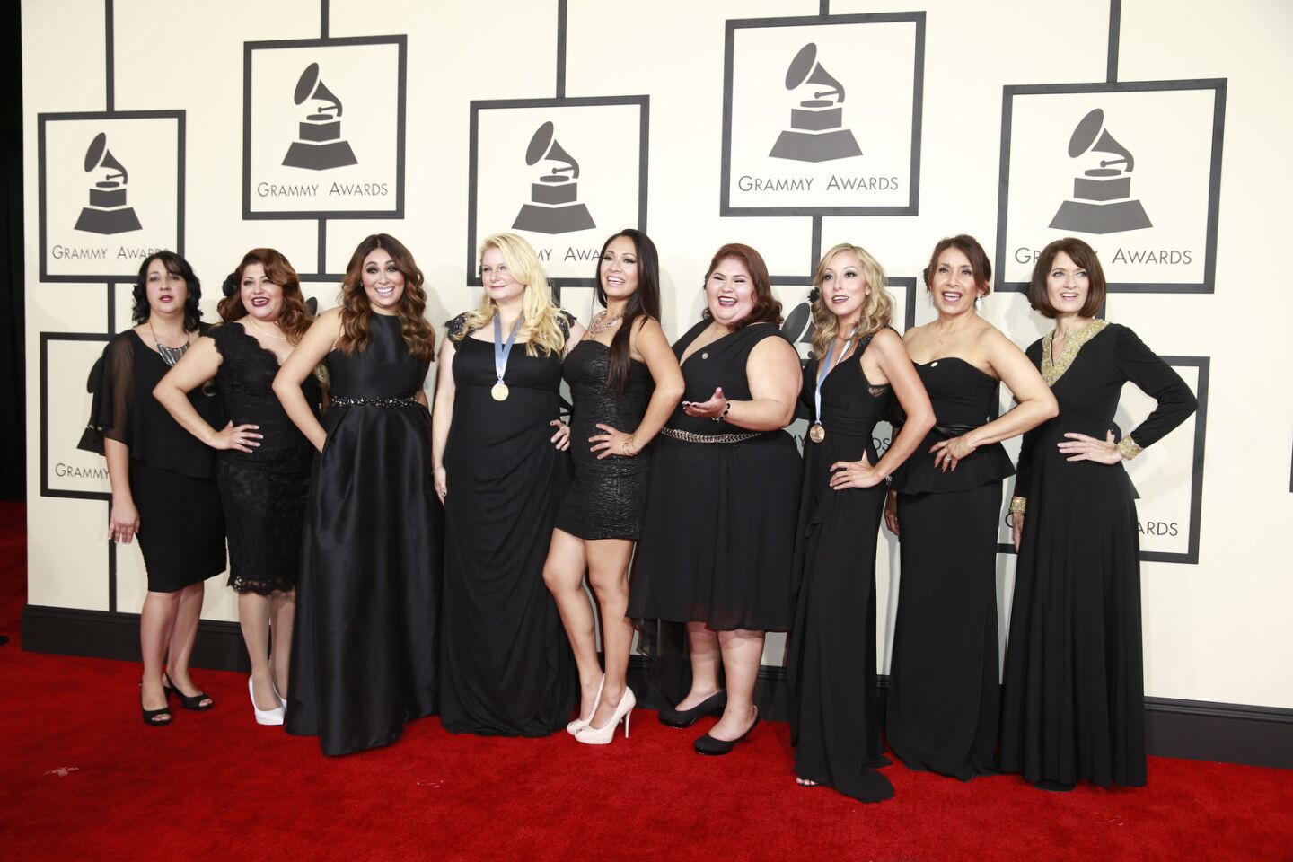 The Grammy-nominated Mariachi Divas arrive on the red carpet for the 57th Grammy Awards at Staples Center in Los Angeles.