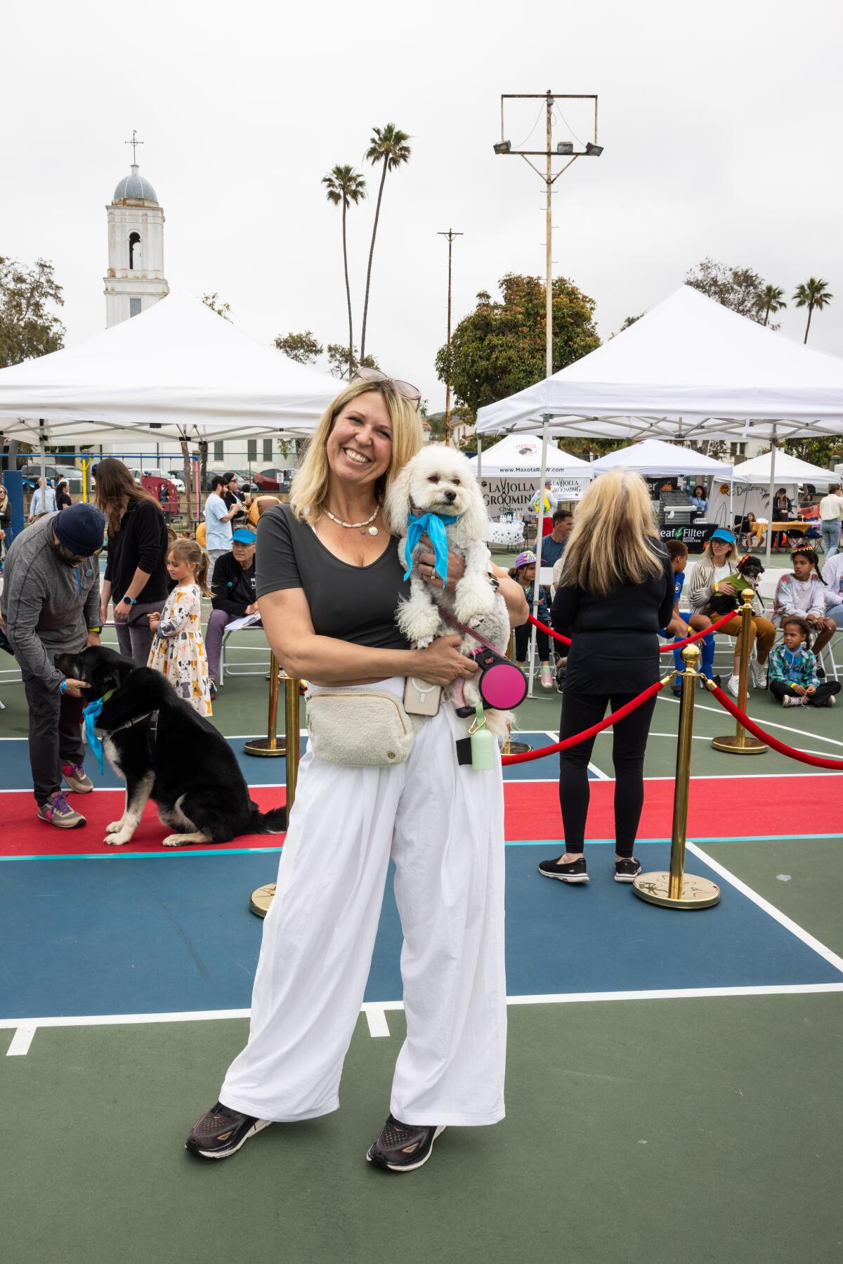 Olga Wharton, founder and director of the La Jolla Loves Pets Foundation, attends the foundation's La Jolla Mutt Strut.