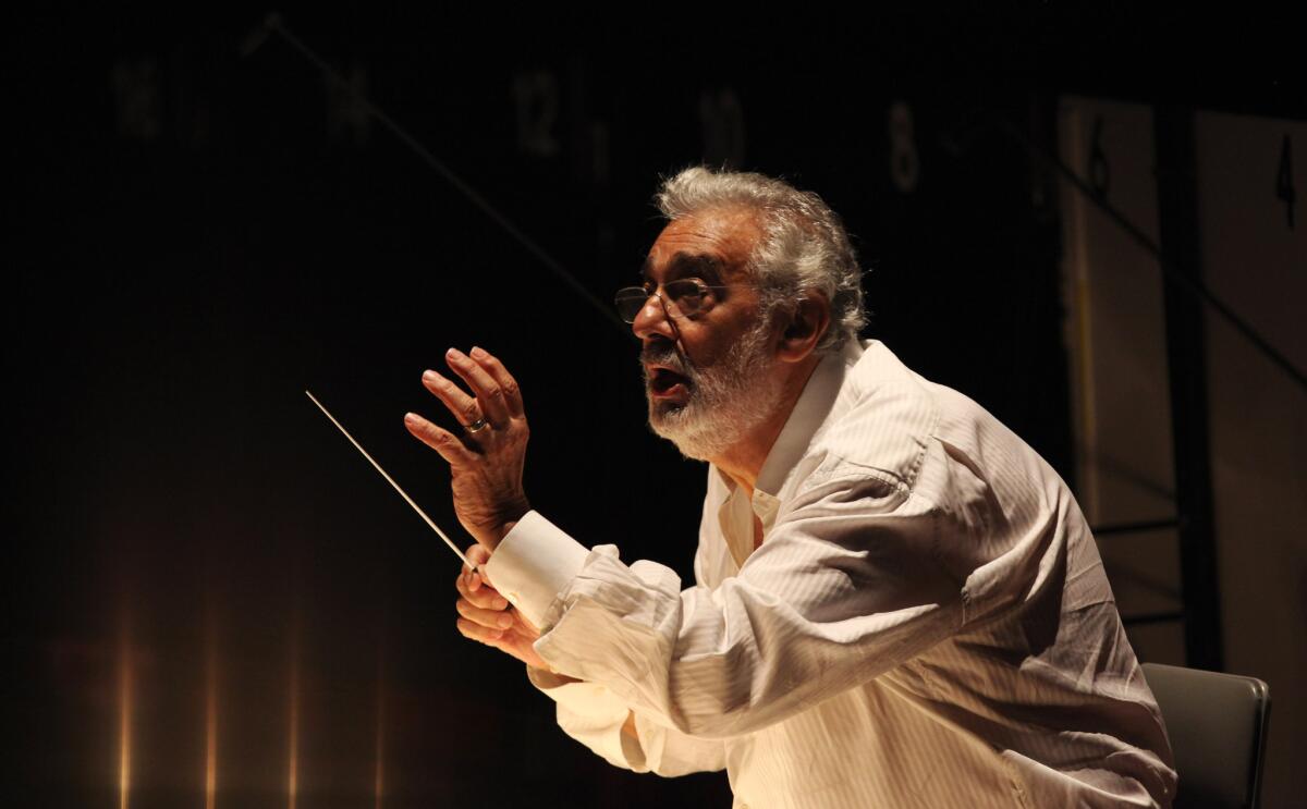 Placido Domingo conducting during a dress rehearsal for Los Angeles Opera's 2013 production of "Carmen" at the Dorothy Chandler Pavilion.