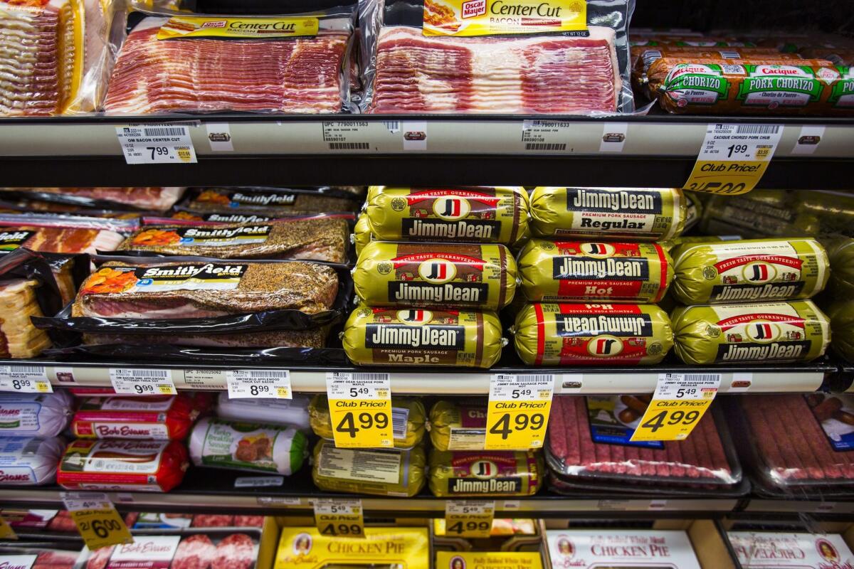 Processed meats on display at a Washington, D.C., grocery store. A new report from the World Health Organization confirms that processed meats can cause cancer, and says that red meat is probably a human carcinogen as well.