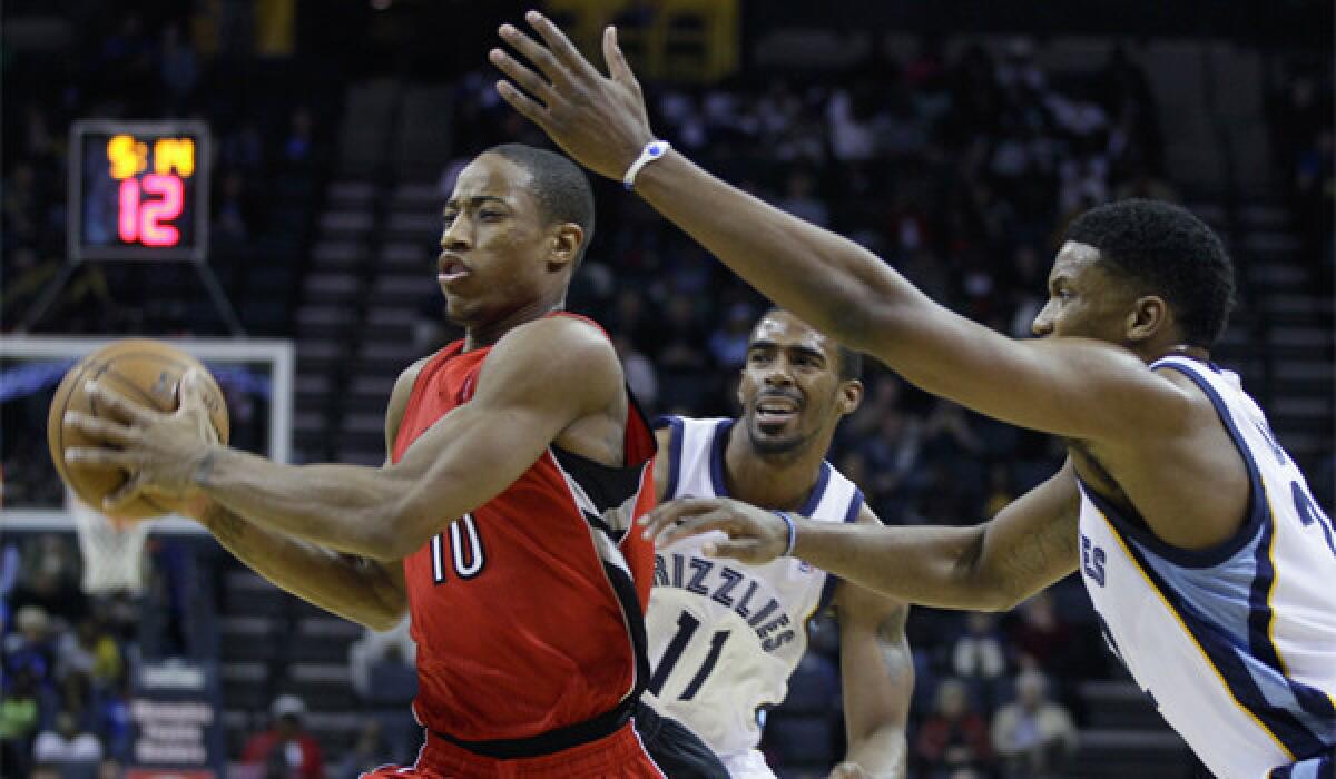 Toronto's DeMar DeRozan, shown against Memphis' Mike Conley and Rudy Gay, leads the Raptors in scoring, averaging 18.1 points per game.