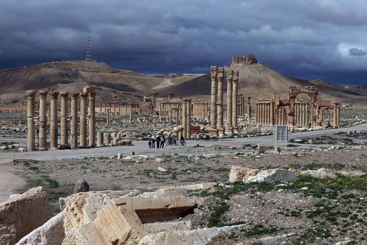 A photo from March 2014 shows the citadel, in the background, of the ancient oasis city of Palmyra, Syria.