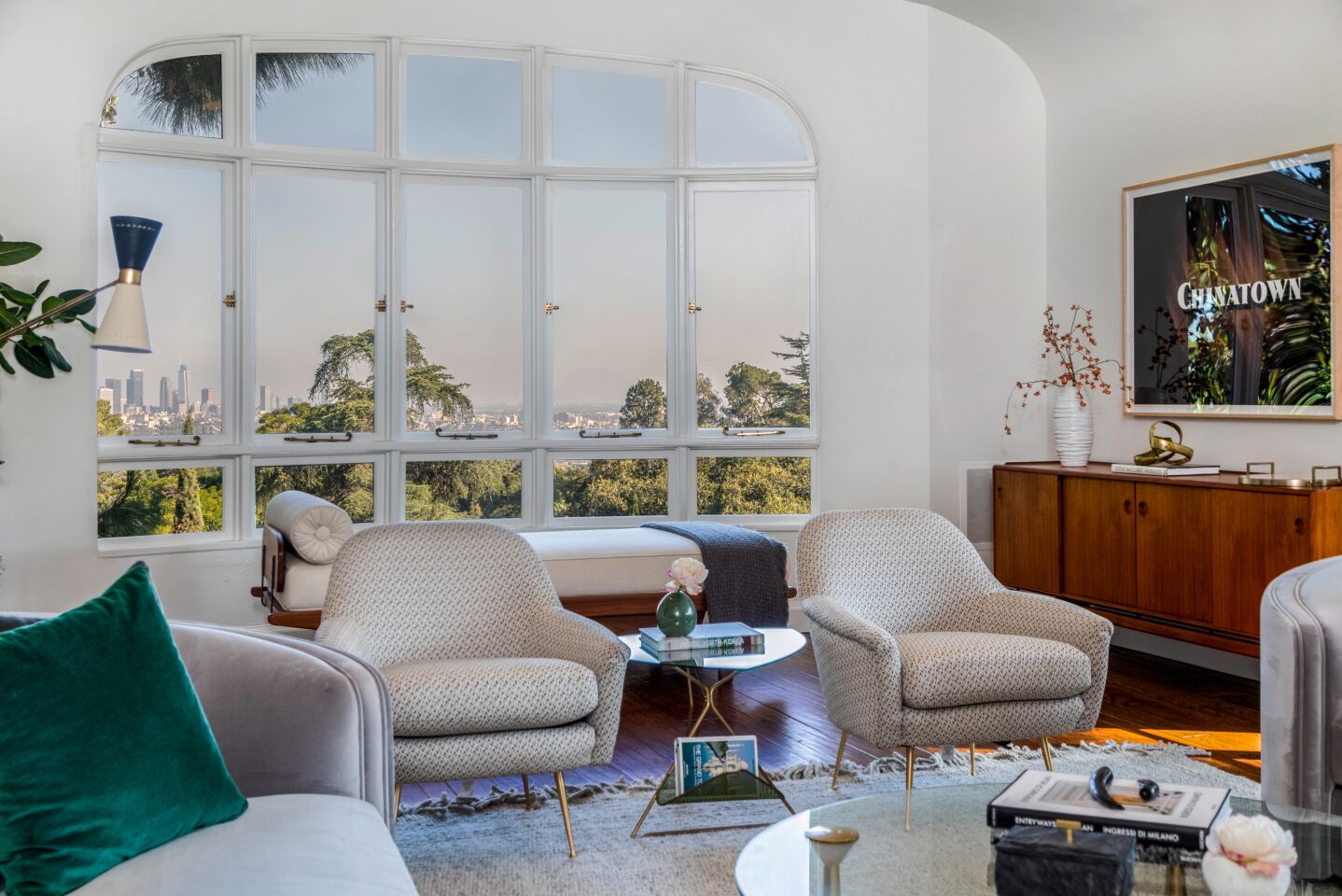 A slightly rolled ceiling and oversized picture window steal the show in the living room.