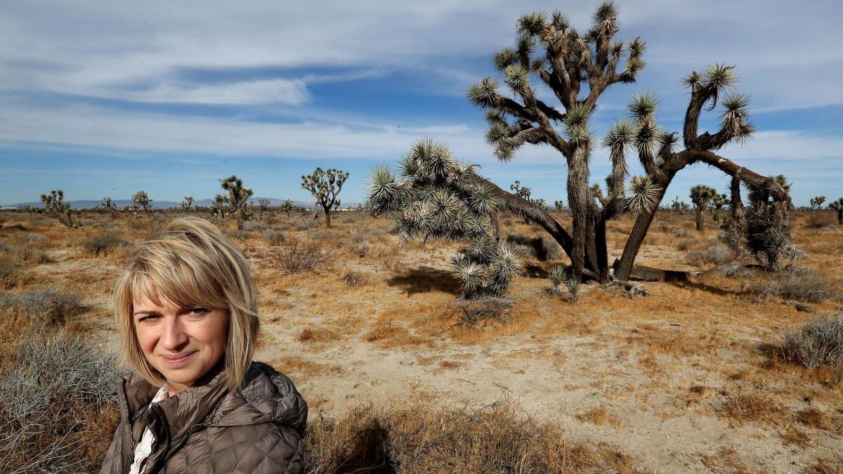 Bryn Lindblad, associate director of the nonprofit environmental group Climate Resolve, in the Mojave Desert in Palmdale, where Caltrans is preparing to build a freeway between Palmdale and Victorville.