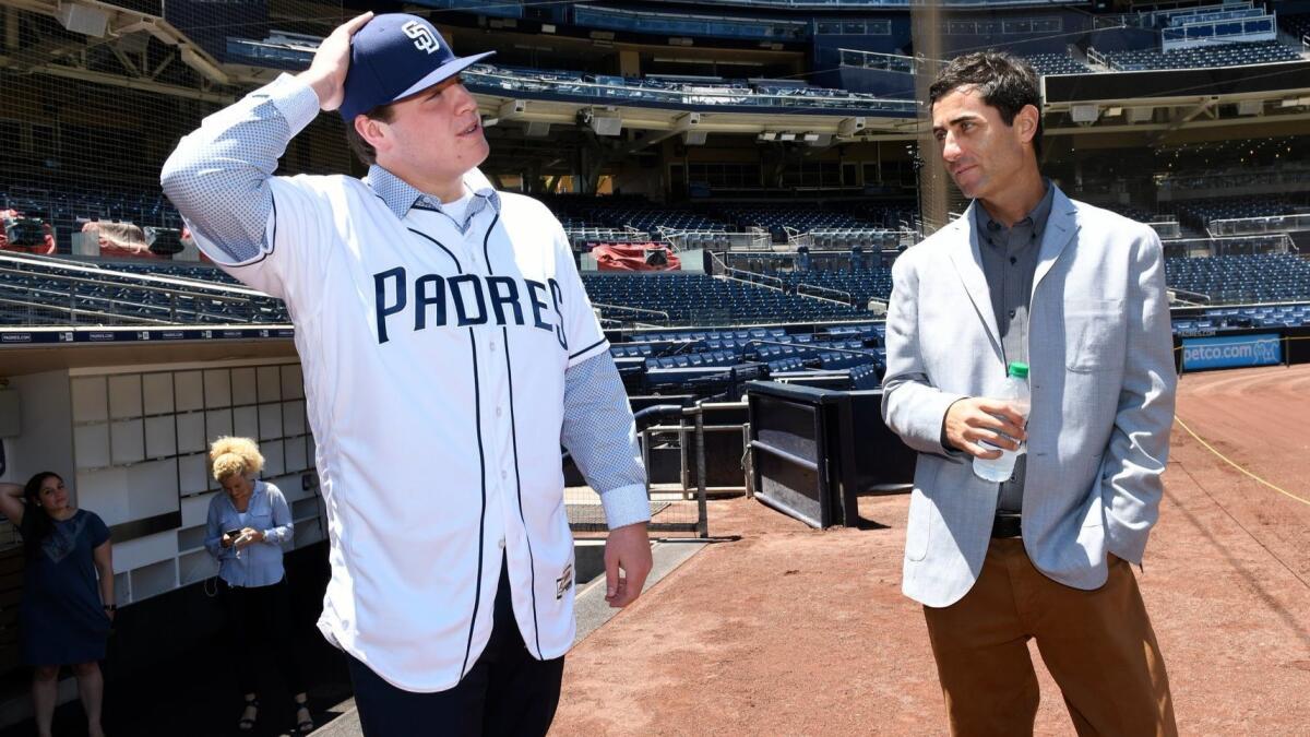 SAN DIEGO, CA - JULY 2: Ryan Weathers, the 2018 number one draft pick, of the San Diego Padres visits with AJ Preller and is introduced to media and poses for photos at PETCO Park on July 2, 2018 in San Diego, California. (Photo by Andy Hayt) *** Local Caption *** Ryan Weathers;AJ Preller