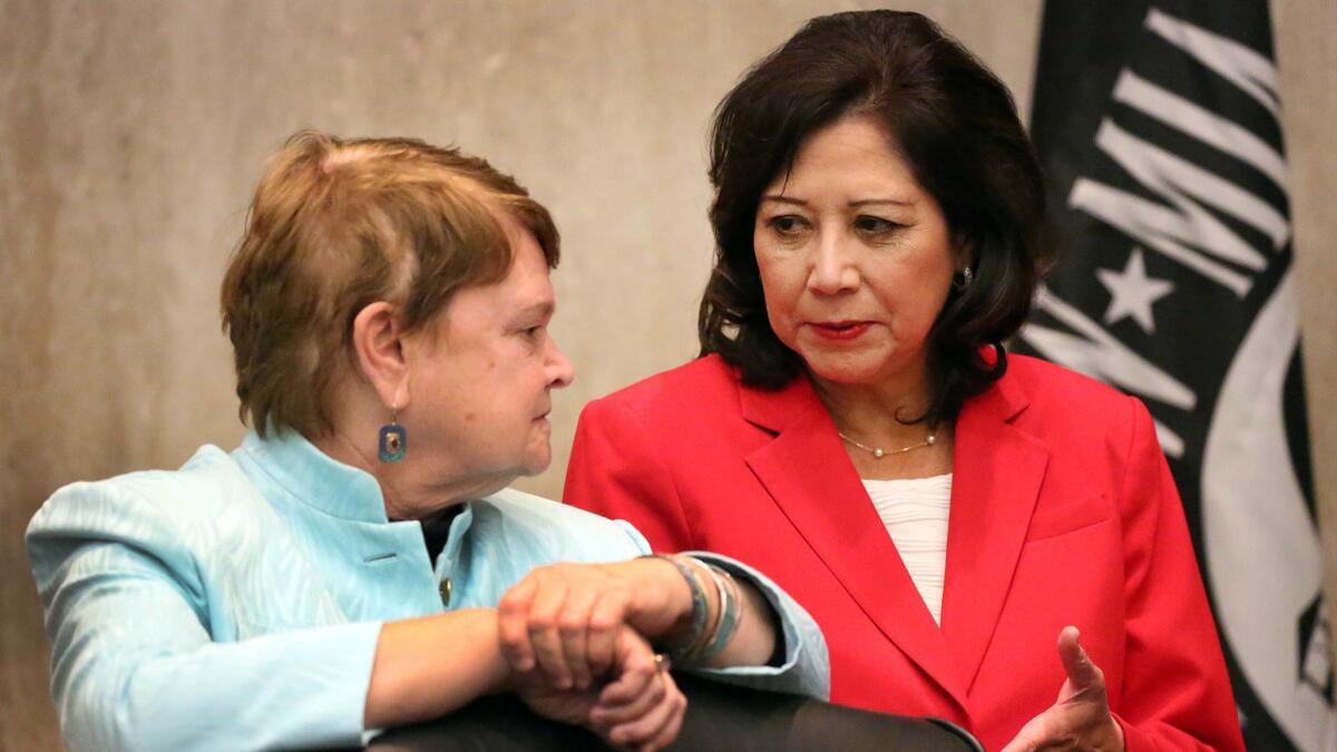 Los Angeles County Supervisors Sheila Kuehl, left, and Hilda Solis in 2015.