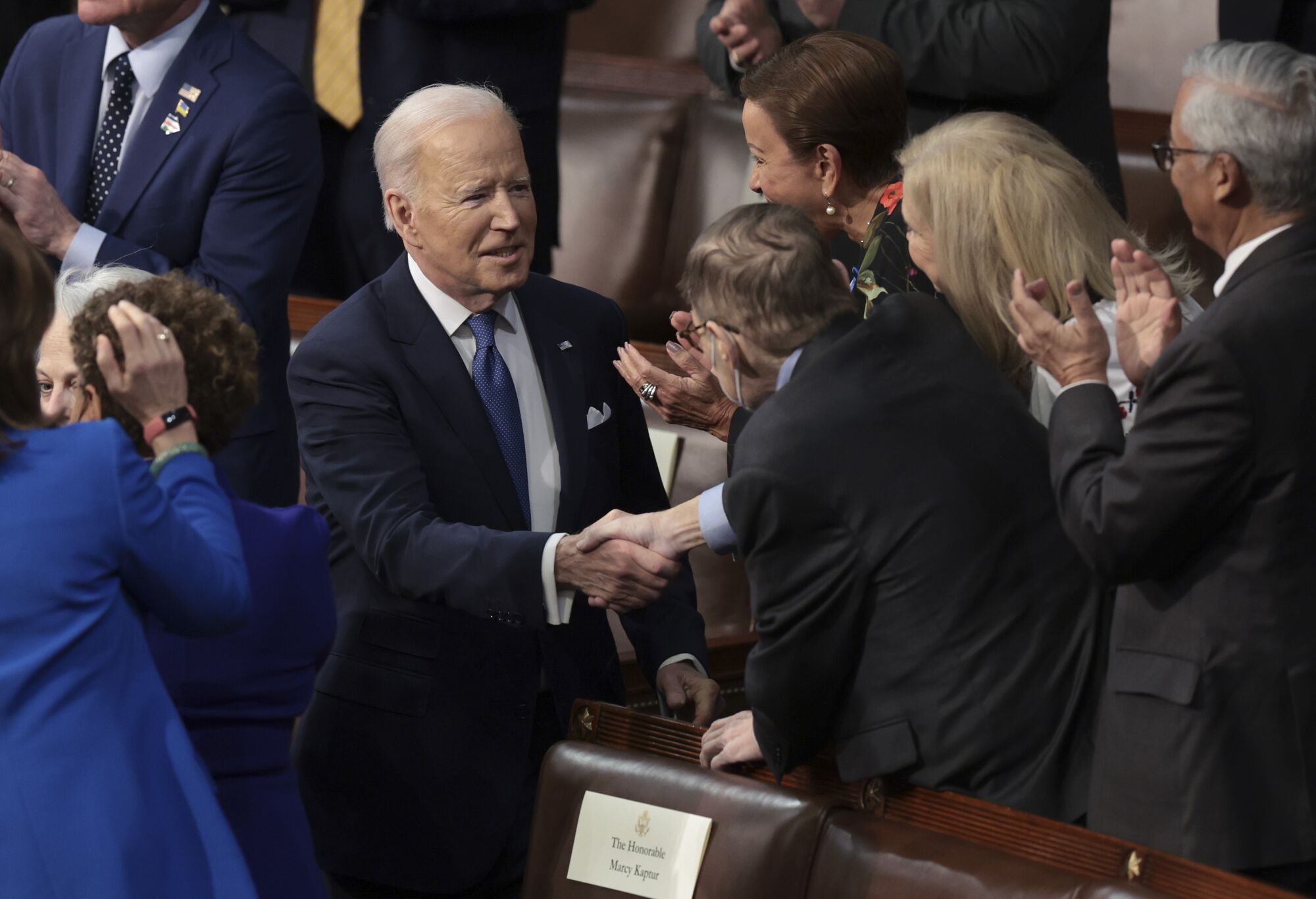 President Biden greets lawmakers in the U.S. Capitol.
