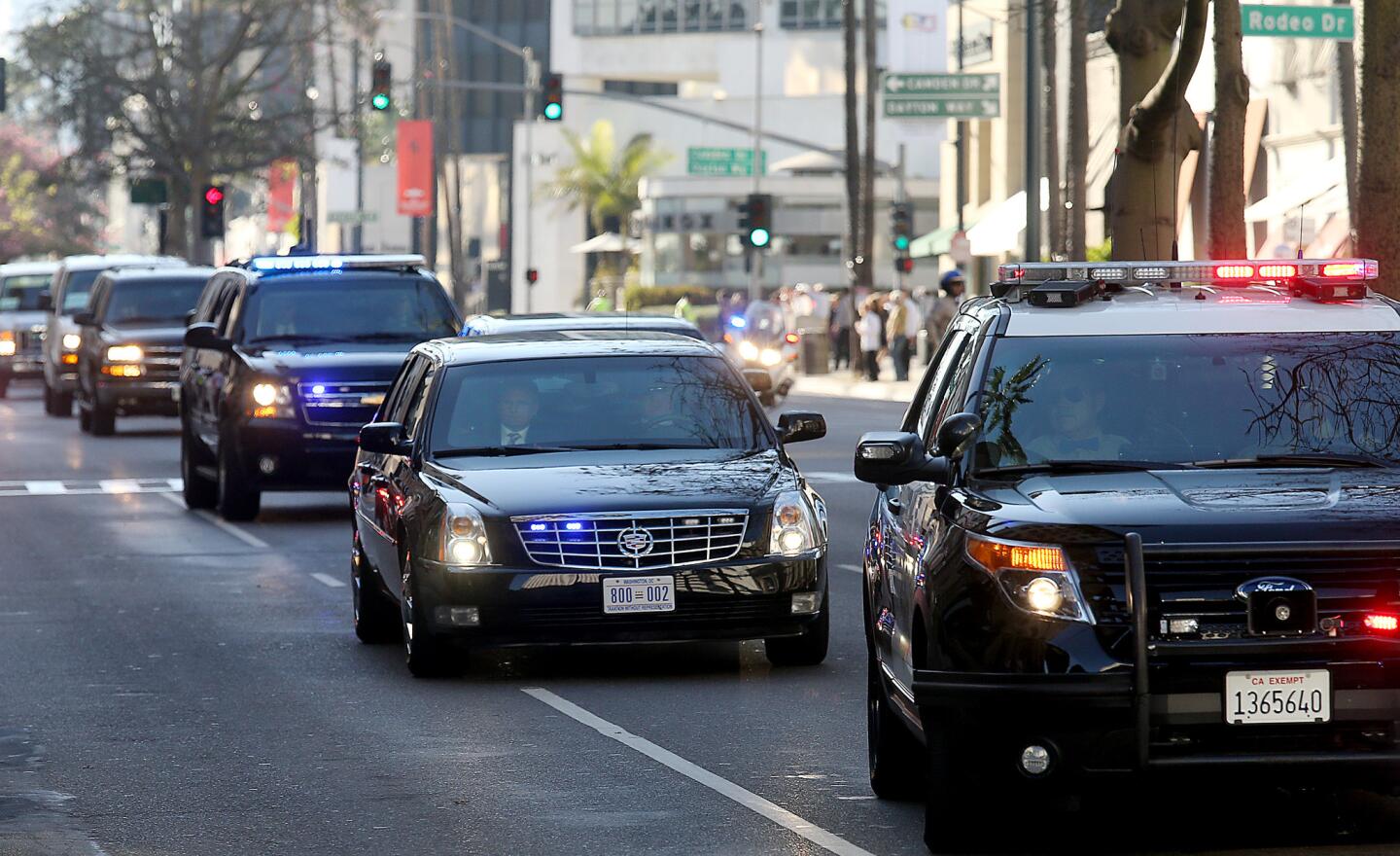 The motorcade of Vice President Joe Biden rolls down Wilshire Boulevard on the way to a fundraising event at the Beverly Wilshire Hotel in Beverly Hills.