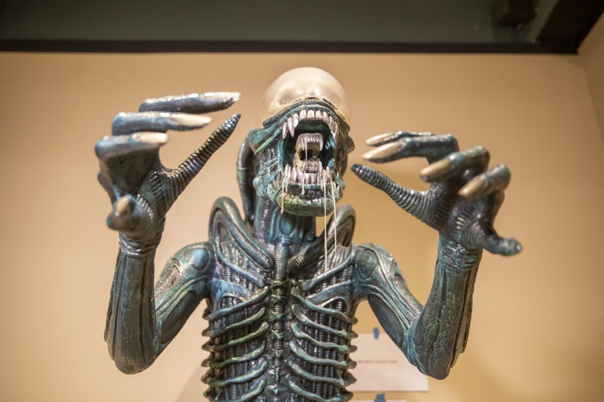 An animatronic alien from the Great Movie Ride is on display at the Bowers Museum.