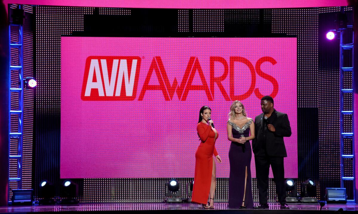 Angela White, webcam model Harli Lotts and actor/comedian Aries Spears co-host the 2018 Adult Video News Awards at The Joint inside the Hard Rock Hotel & Casino on January 27, 2018 in Las Vegas, Nevada.