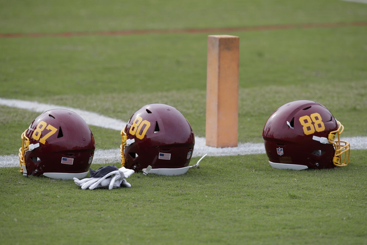 nfl teams with two helmets