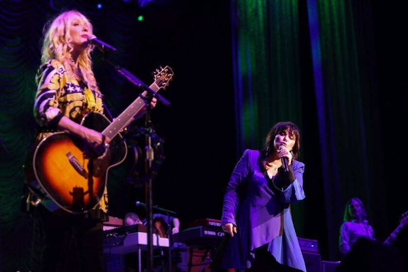 Nancy (left) and Ann Wilson of Heart. The band was inducted into the Rock and Roll Hall of Fame in 2013 and is now back on tour for the first time in three years.