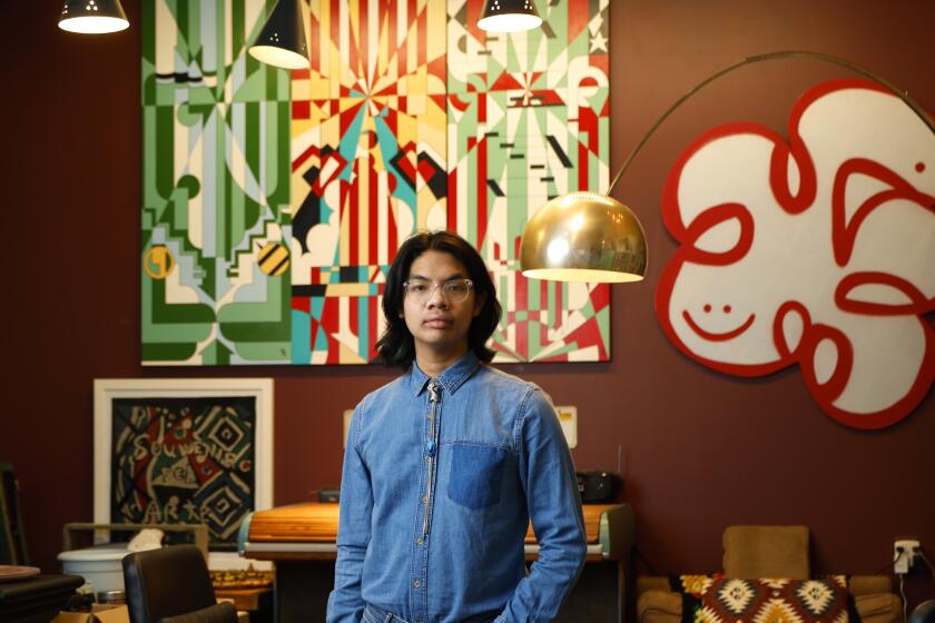 Artist Ethan Chan photographed in the Mark Quint workspace.