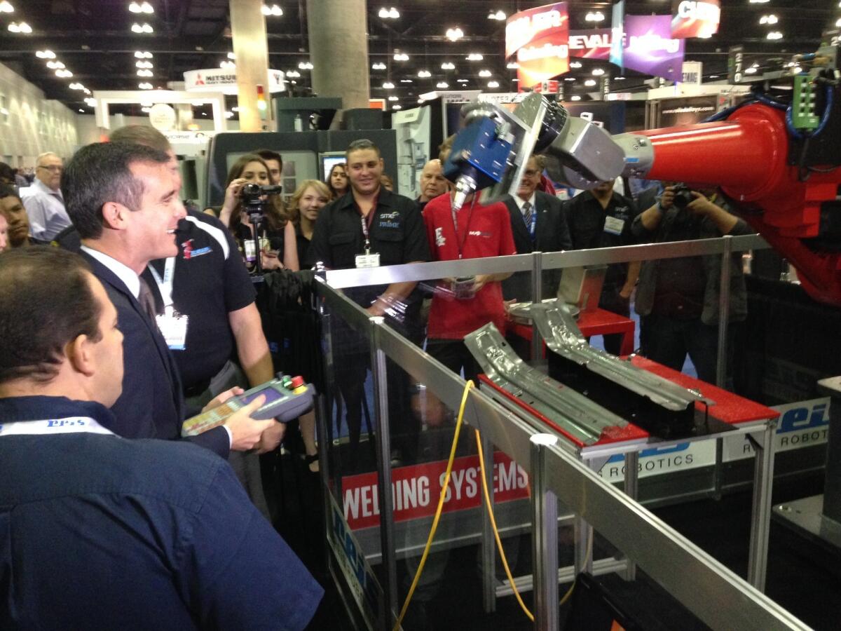 Los Angeles Mayor Eric Garcetti toured the WESTEC manufacturers convention on Tuesday in downtown Los Angeles.