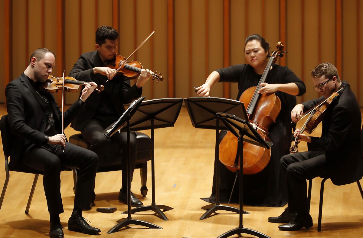 The Calidore String Quartet, from left, violinist Jeffrey Myers, violinist Ryan Meehan, cellist Estelle Choi and violist Jeremy Berry. They began the Colburn School’s complete Beethoven quartet cycle at Zipper Hall on Wednesday. 