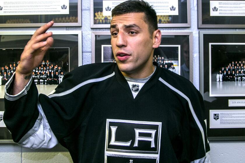 Milan Lucic takes questions from members of the media after the former Bruins winger was introduced as the newest member of the Kings on Saturday in El Segundo.