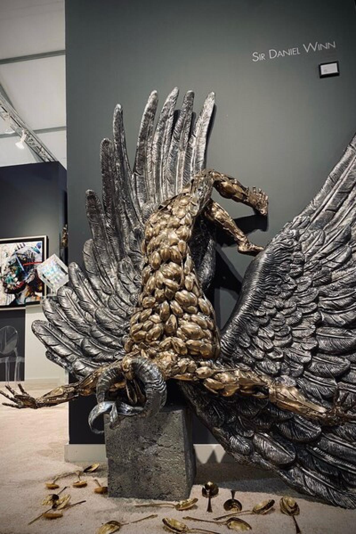 Sir Daniel Winn's "Icarus Within" is 8 feet tall, weighs about 2,000 pounds and is valued at $350,000.