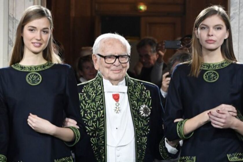 Pierre Cardin, center, during his runway walk at his 70th anniversary show.