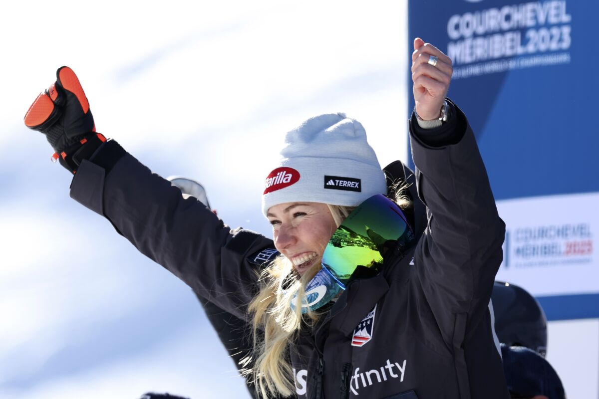 United States' Mikaela Shiffrin celebrates taking second place in an alpine ski, women's World Championships super G, in Meribel, France, Wednesday, Feb. 8, 2023. (AP Photo/Alessandro Trovati)