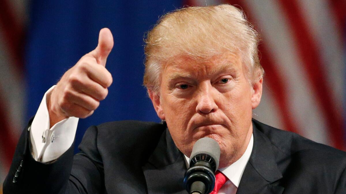 Republican presidential candidate Donald Trump gestures as he speaks in Las Vegas on June 18.