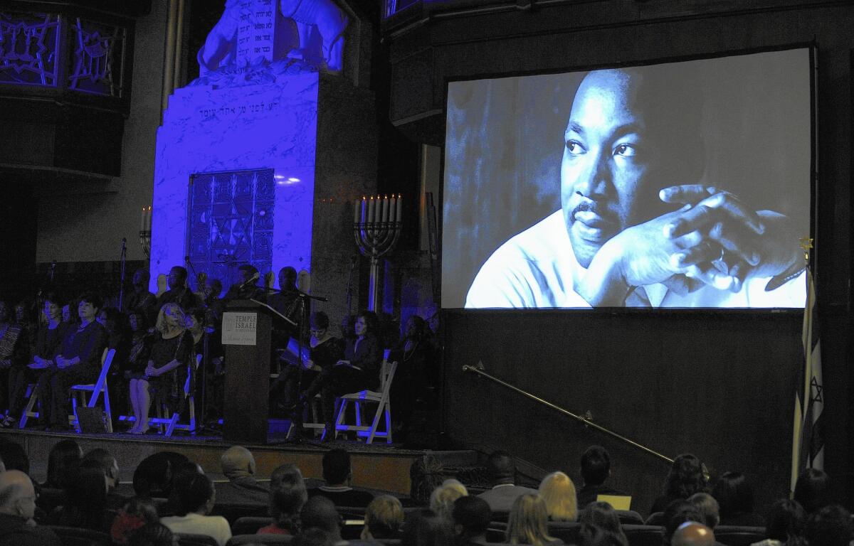 An image of Dr. Martin Luther King Jr. is displayed Sunday night during the 50th anniversary of a speech that he gave at the Temple Israel of Hollywood.