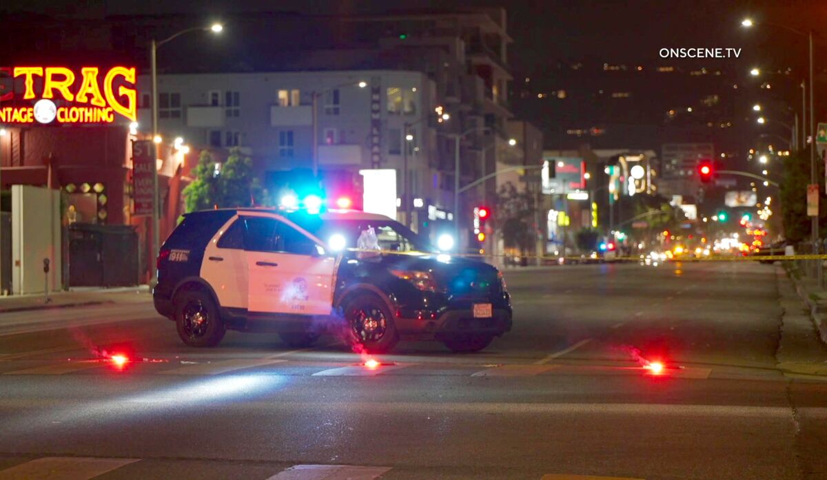 Police are searching for a suspect after a woman was shot in the Hollywood area Monday night