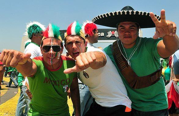 Mexican soccer fans cheer for their team before a FIFA World Cup qualifying round match against the U.S. at Azteca Stadium in Mexico City.
