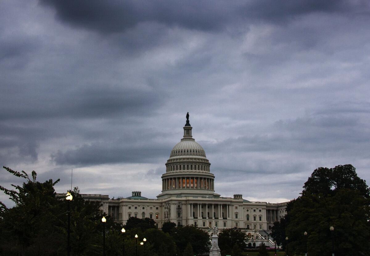Storm clouds hang over Capitol Hill in Washington.
