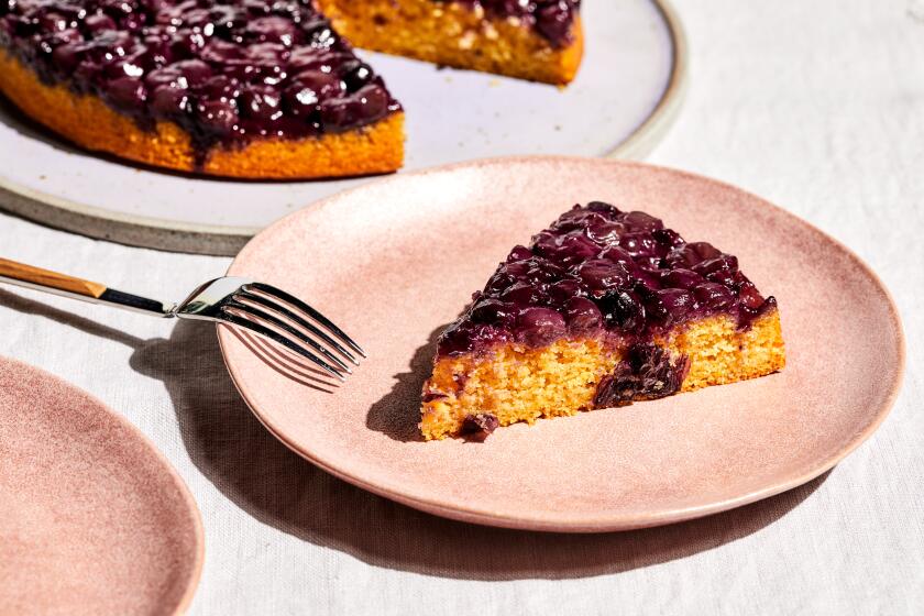 LOS ANGELES, CA - SEPTEMBER 8, 2022: Grape-corn cake, prepared by cooking columnist Ben Mims on September 8, 2022 in the LA Times test kitchen. (Katrina Frederick / For The Times)