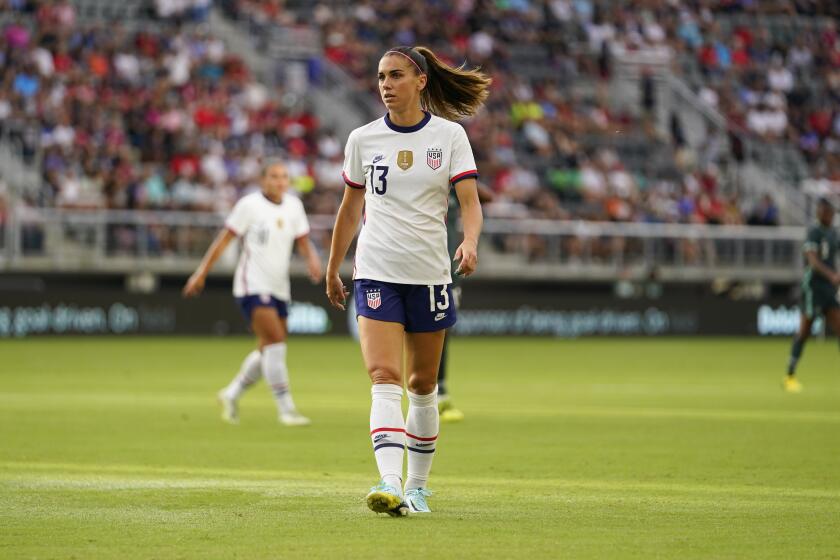 United States' Alex Morgan during the first half of an international friendly soccer match against Nigeria, Tuesday, Sept. 6, 2022, in Washington. (AP Photo/Julio Cortez)