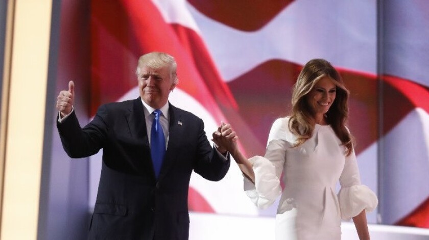 Donald Trump and his wife, Melania, appear at the Republican National Convention on Monday.