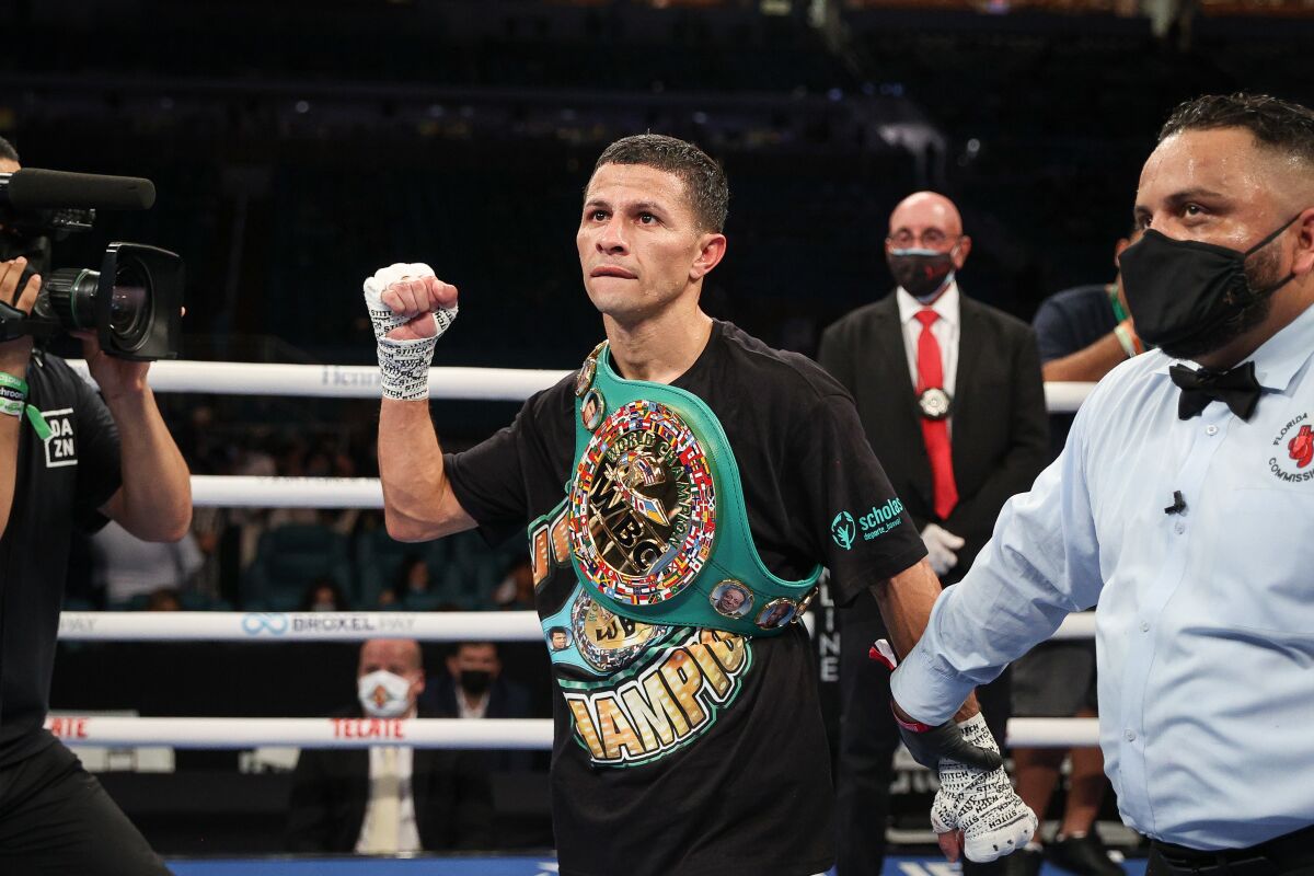McWilliams Arroyo celebrates after defeating Abraham Rodriguez during their WBC interim flyweight title fight on Saturday.