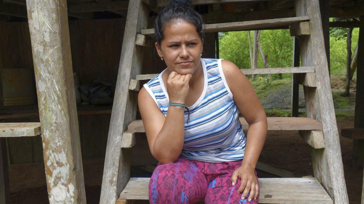 "No one from the government has been around to apologize or talk about compensation. I don't know how my 13-year-old son and I are going to manage,” said Joana Mopan, whose husband was among the coca farmers killed by police Oct. 5.