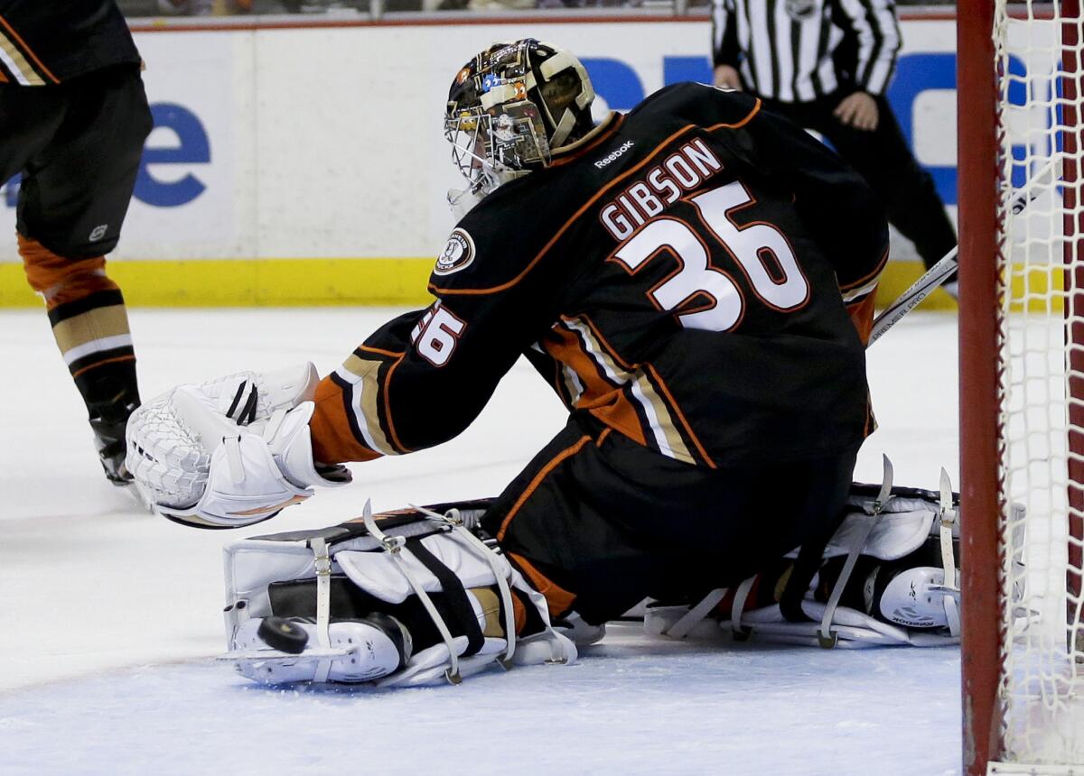 Ducks goalie John Gibson blocks a Tampa Bay shot during the first period of Anaheim's 4-1 loss to the Lightning on Wednesday at Honda Center. Gibson gave up four goals to the Lightning.