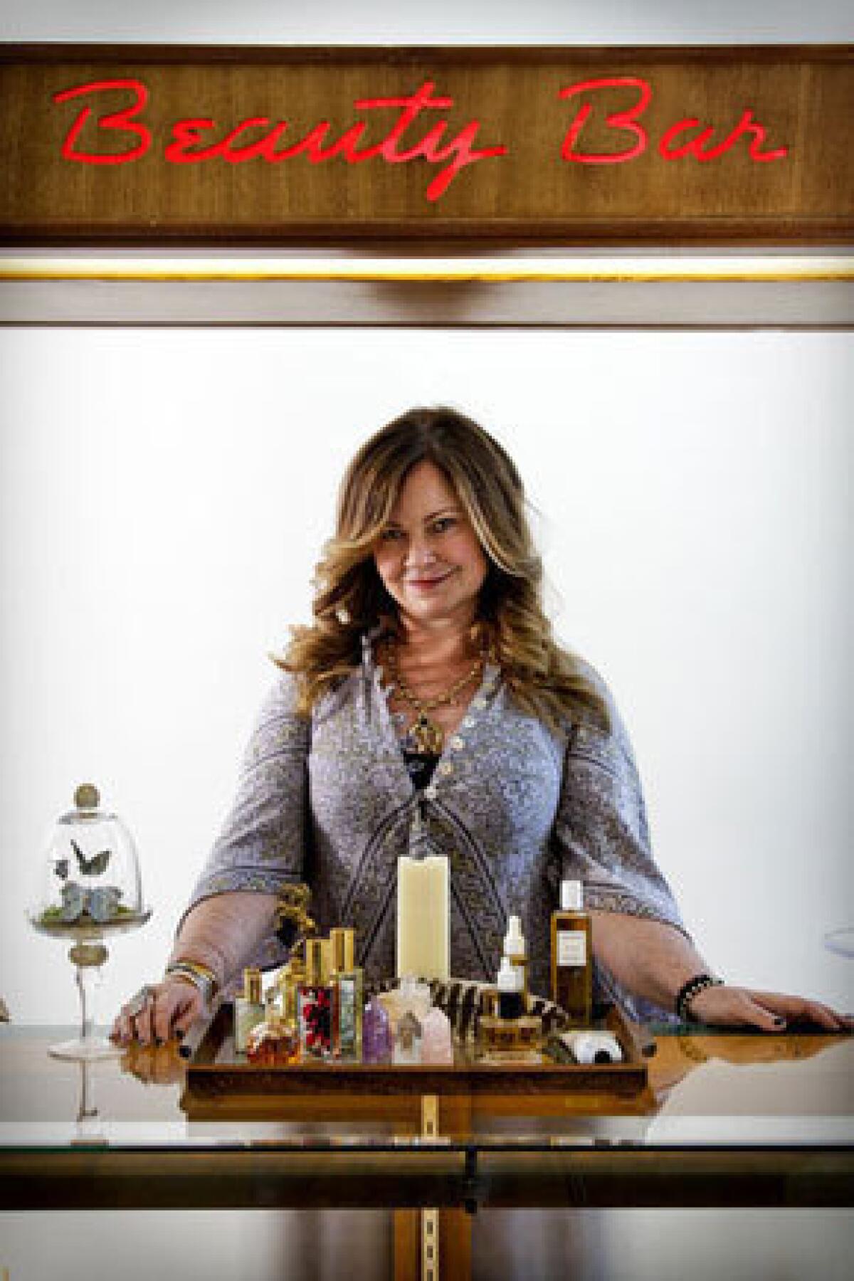Jennifer Nicholson behind the Beauty Bar at her Venice boutique Pearl Drop.