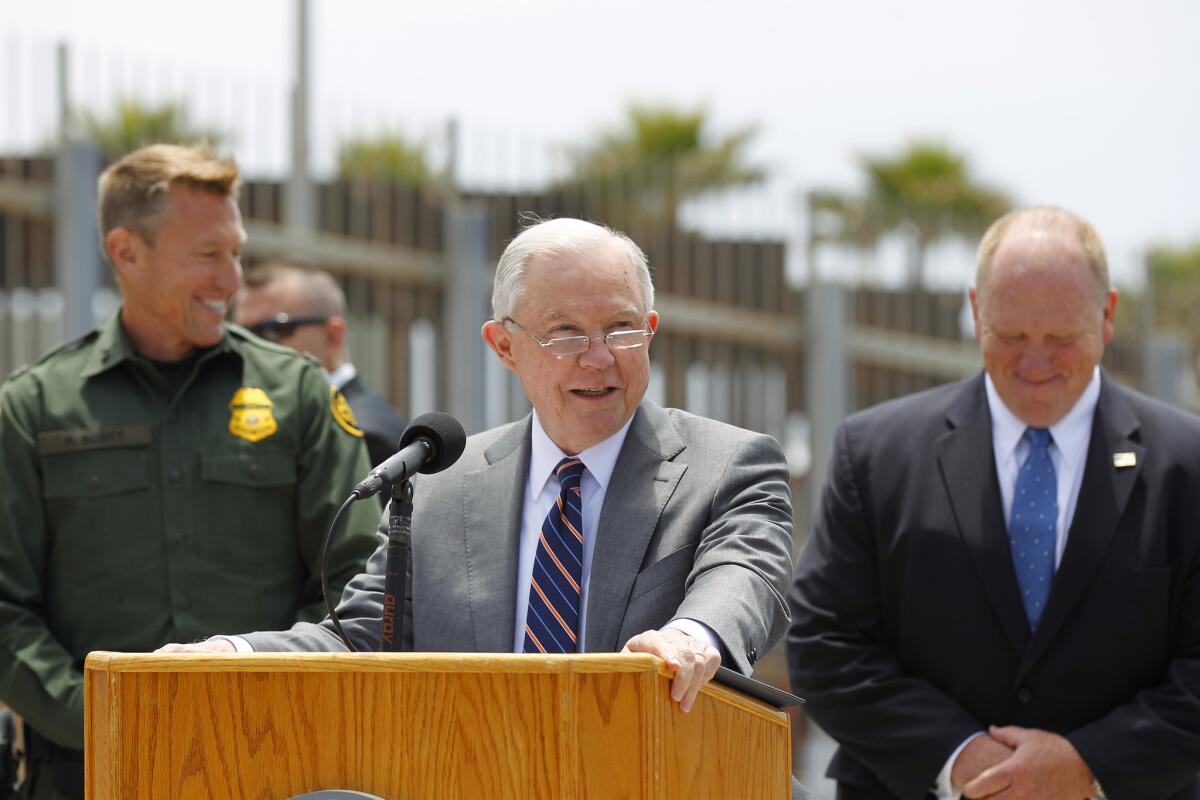 Attorney General Jeff Sessions spoke at a news conference at Border Field State Park with Tijuana, Mexico behind him on May 7, 2018, in San Diego. Sessions discussed immigration enforcement during his Southern California visit .(Photo by K.C. Alfred/ San Diego Union -Tribune)