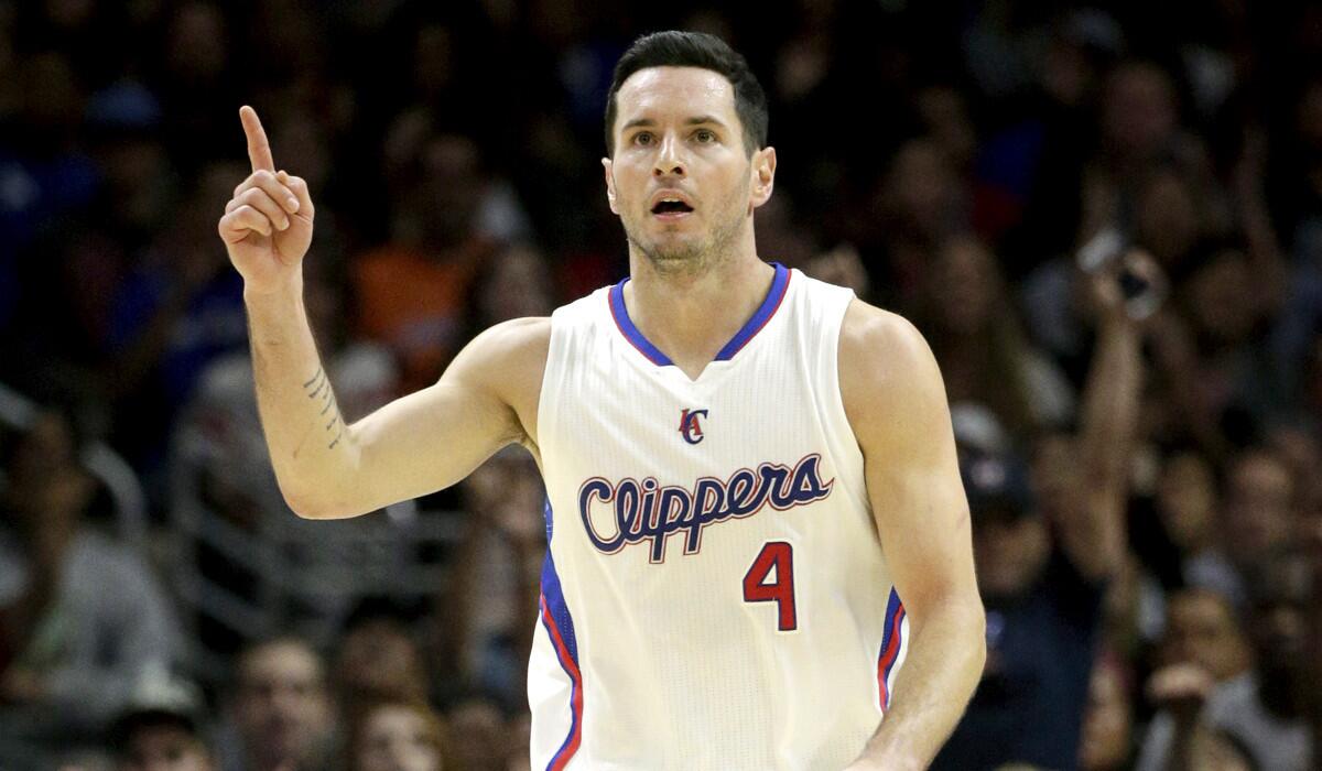 Clippers guard J.J. Redick reacts after making one of his 11 shots during a 30-point performance against the Trail Blazers on Saturday.
